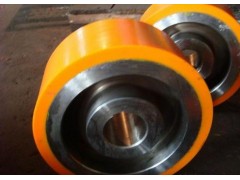 供应湖北武汉焊接滚轮架上载重轮聚氨酯包胶，耐磨橡胶包胶图1